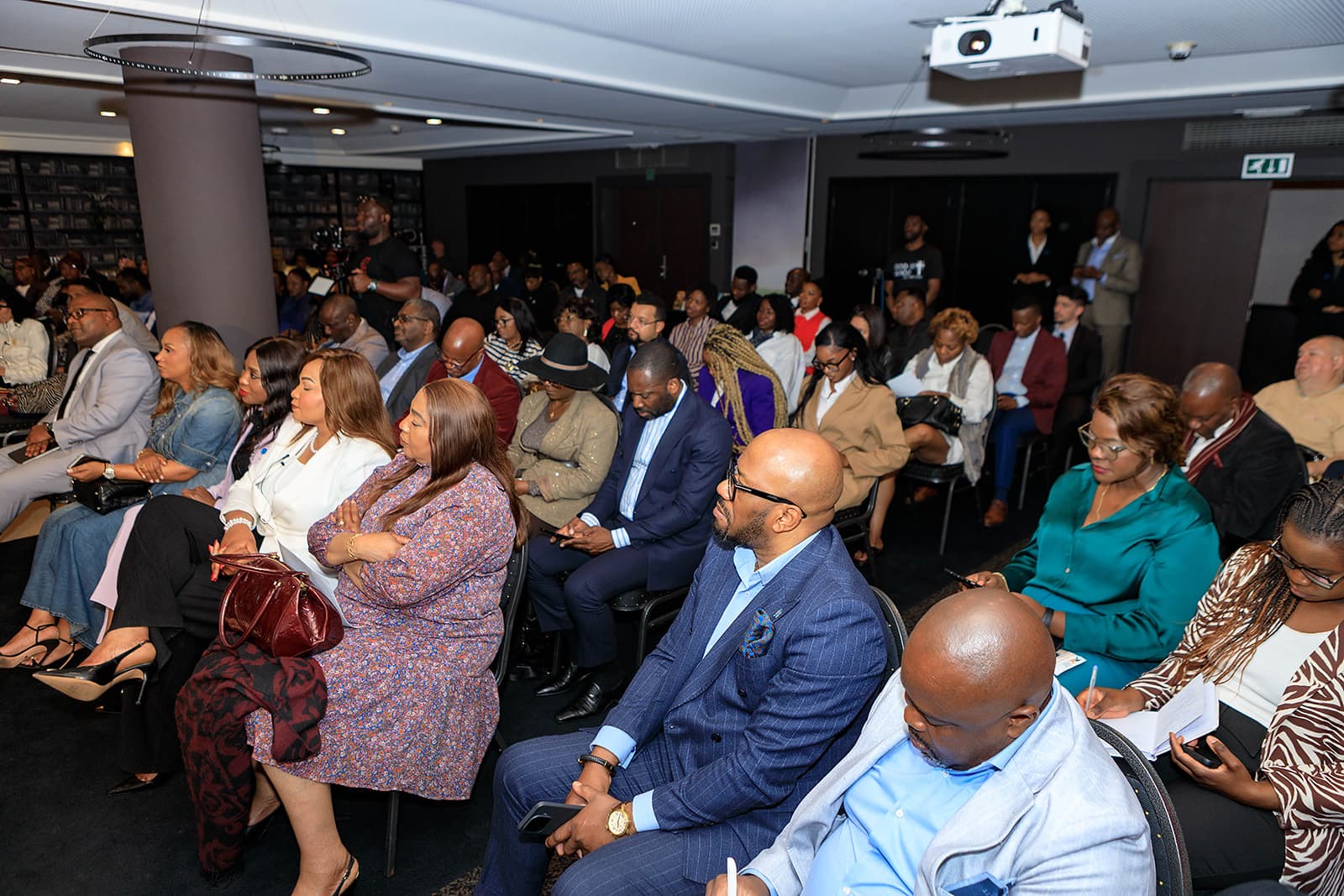 Engaged audience during a Diambilay Business Center MasterClass session.